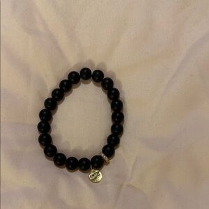 Elegant Black Beaded Bracelet with Gold Charm